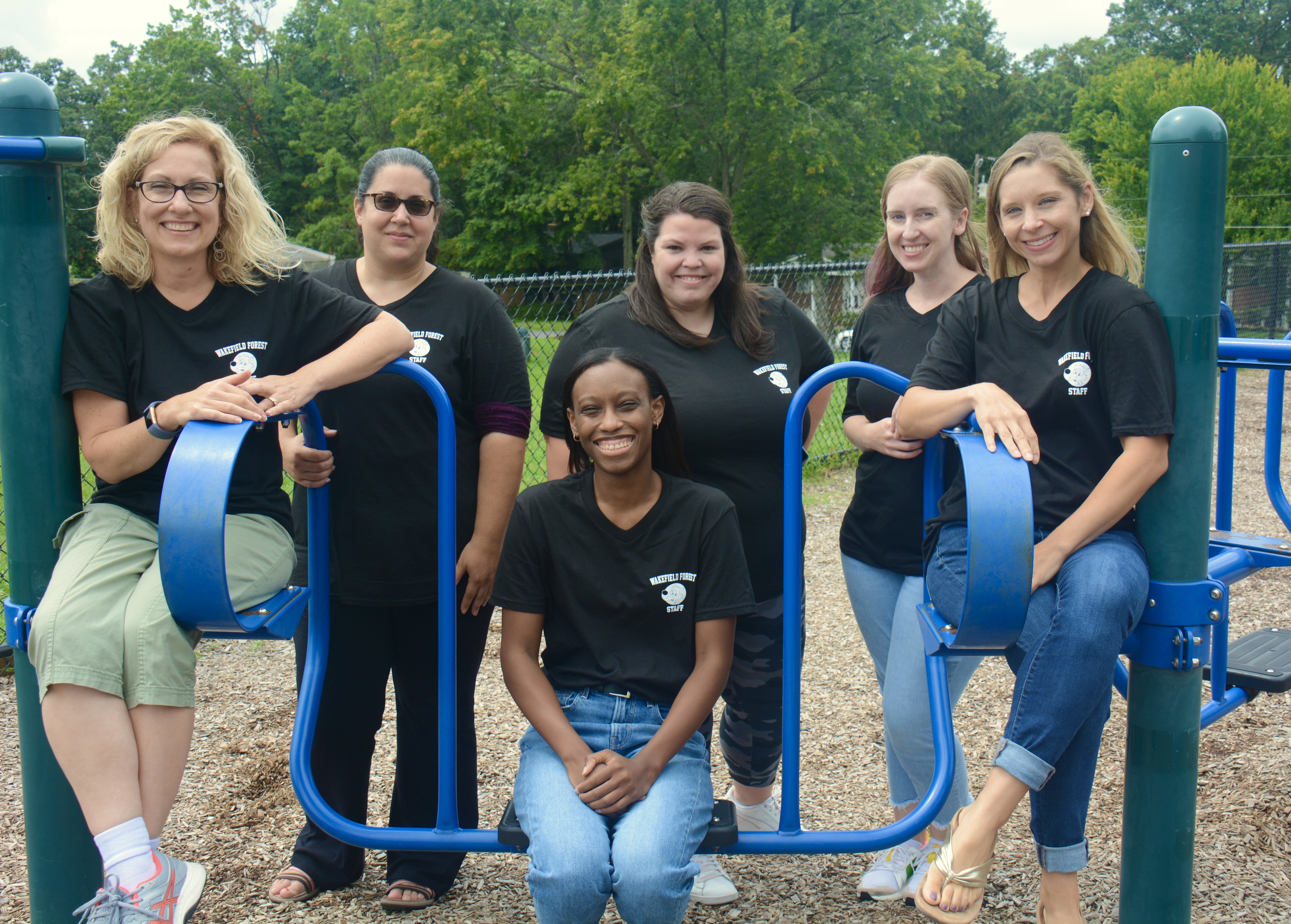 Picture of the third grade team on playground equipment