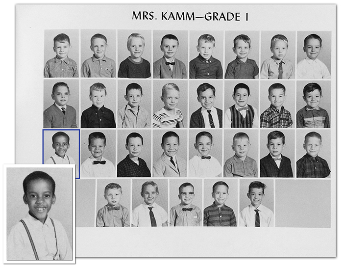 Black and white class photograph of Mrs. Kamm's first grade class during the 1964 to 1965 school year. It is an all-boys class and 29 boys are pictured. Only one child in the entire school is African-American and he is pictured here in the bottom left corner. His name is unknown at this time. 
